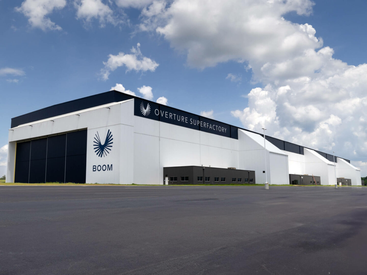 Exterior image of the Overture Superfactory, showing the completed hangar door.