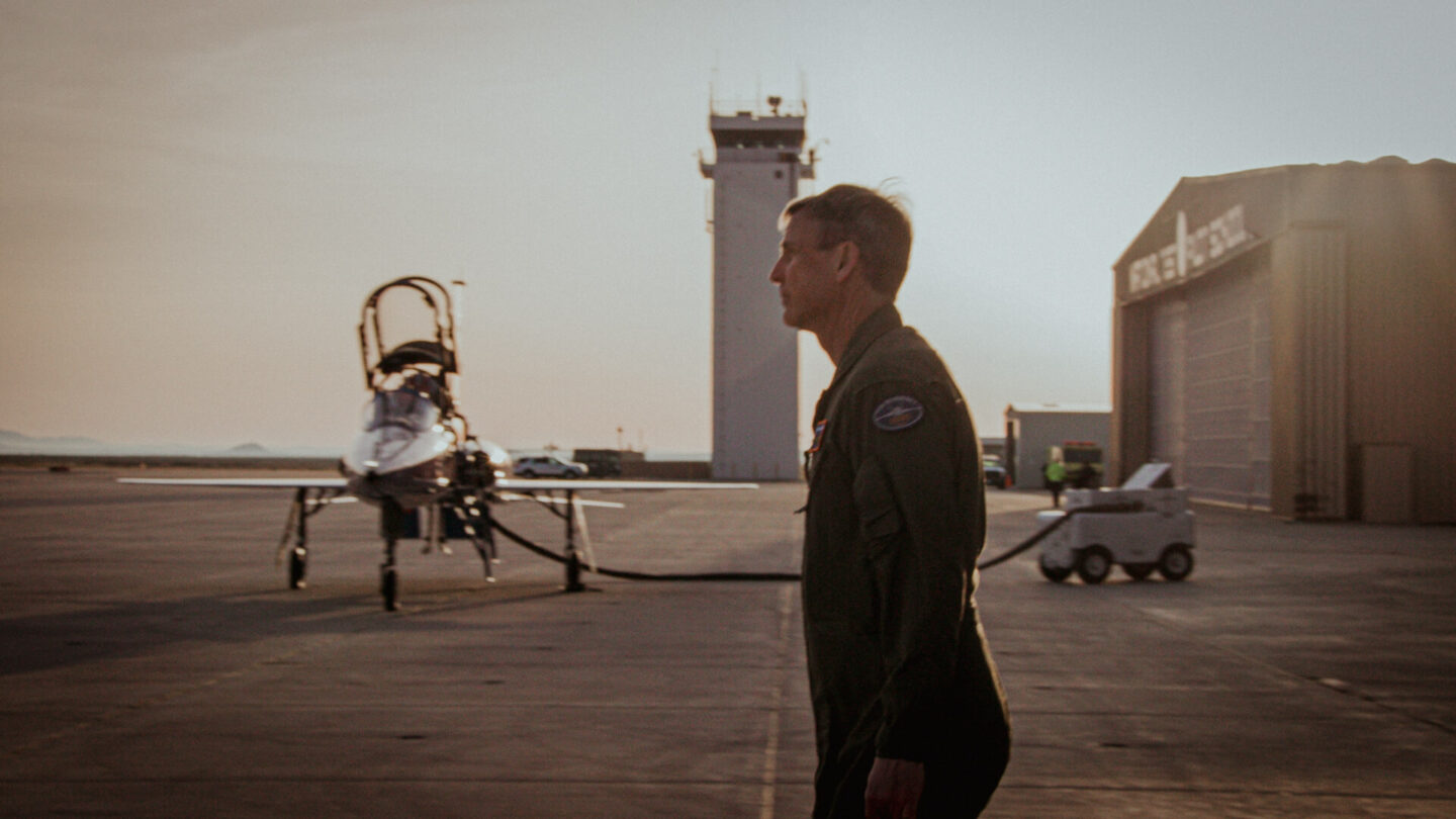 Bill 'Doc' Shoemaker on the tarmac of the Mojave Air & Space Port with XB-1, Boom's supersonic demonstrator, in the background.