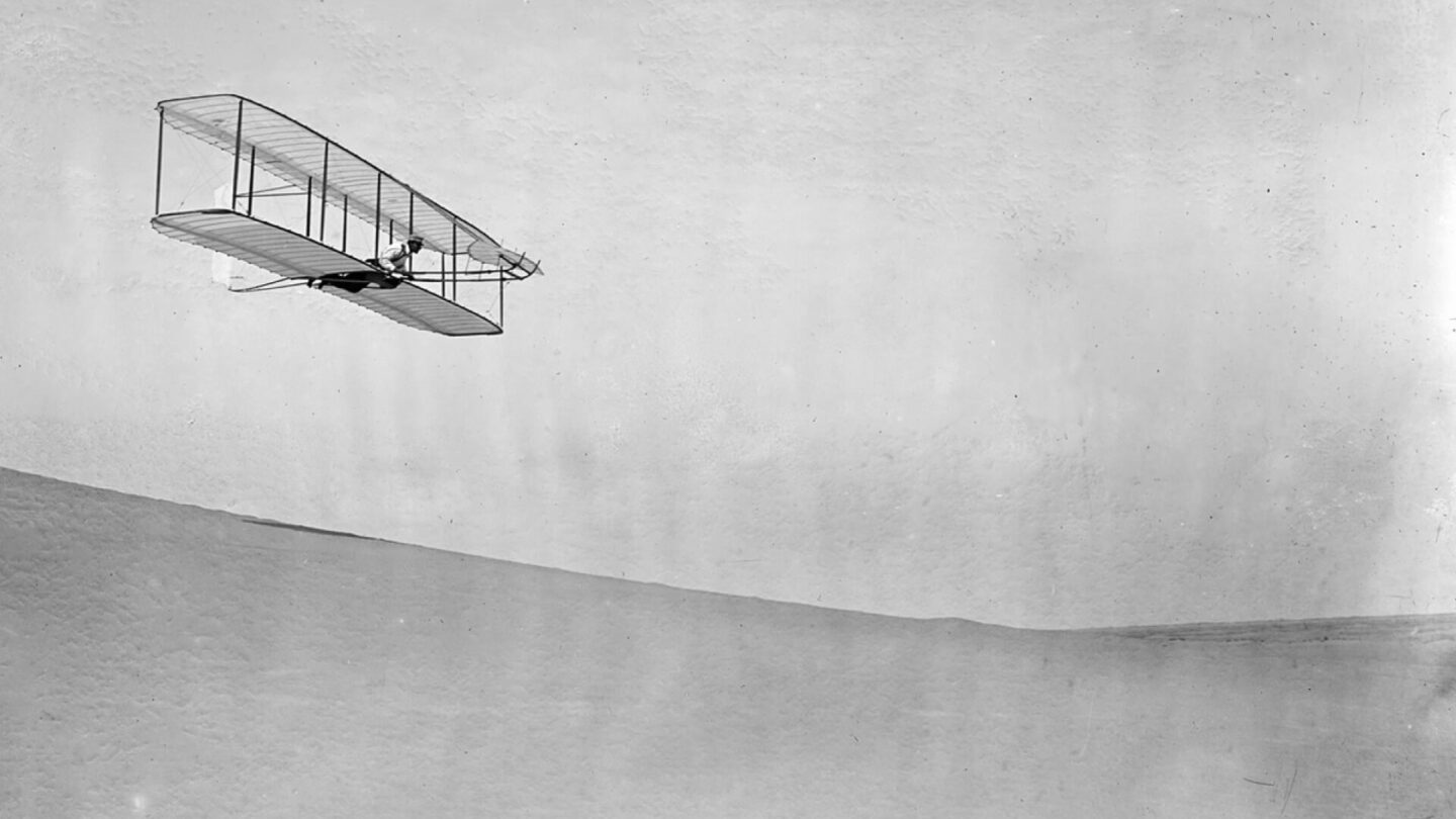This image shows the first flight by the Wright Brothers in 1903.